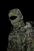MULTICAM 2-in-1 balaclava worn with the hood deployed over a MULTICAM plate carrier