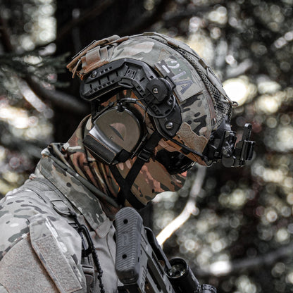Face and neck covering worn in the field under a helmet with comms headset